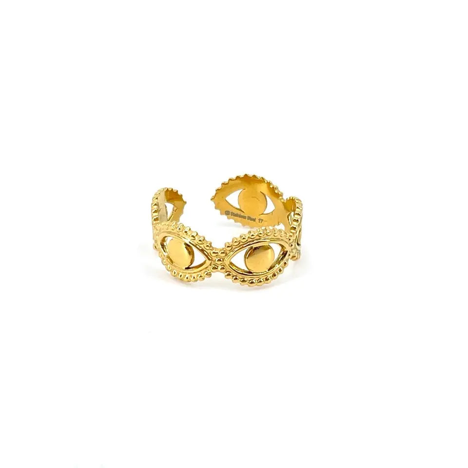 Bague ajustable en acier inoxydable doré composée d'un motif en forme d’œil accolé