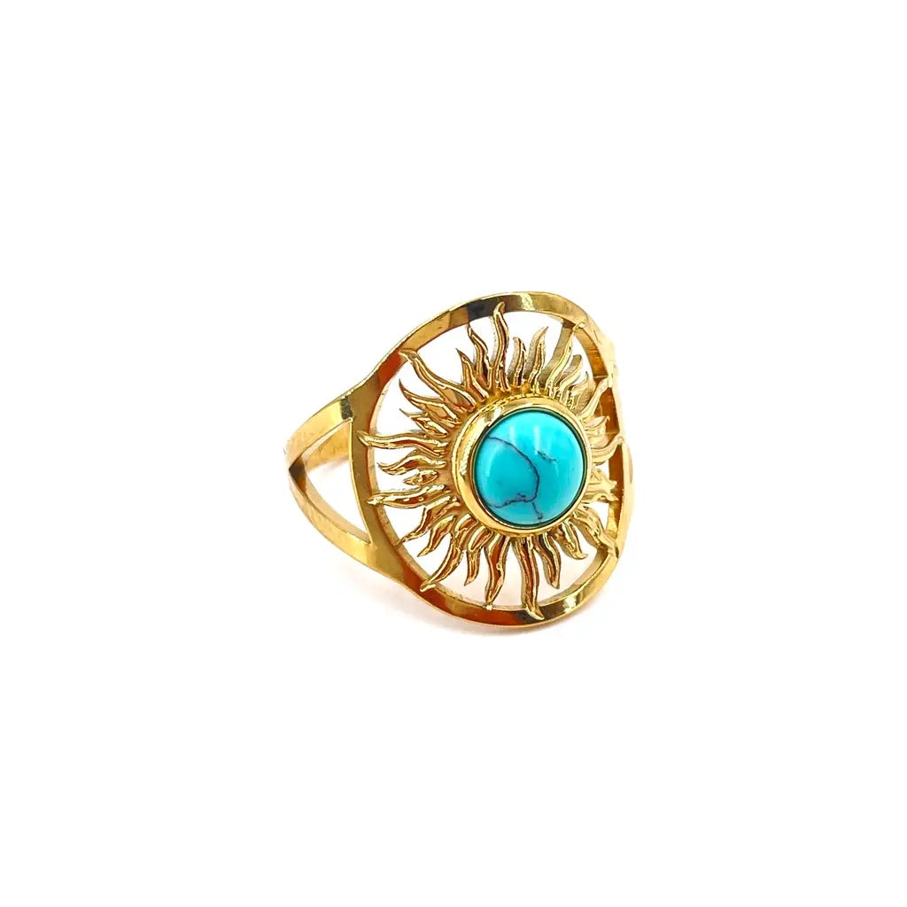 Bague ronde en forme de soleil orné d'une pierre turquoise