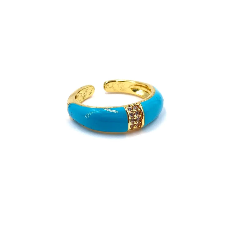 Bague fine en acier inoxydable ornée de strass au centre et d’une finition colorée turquoise