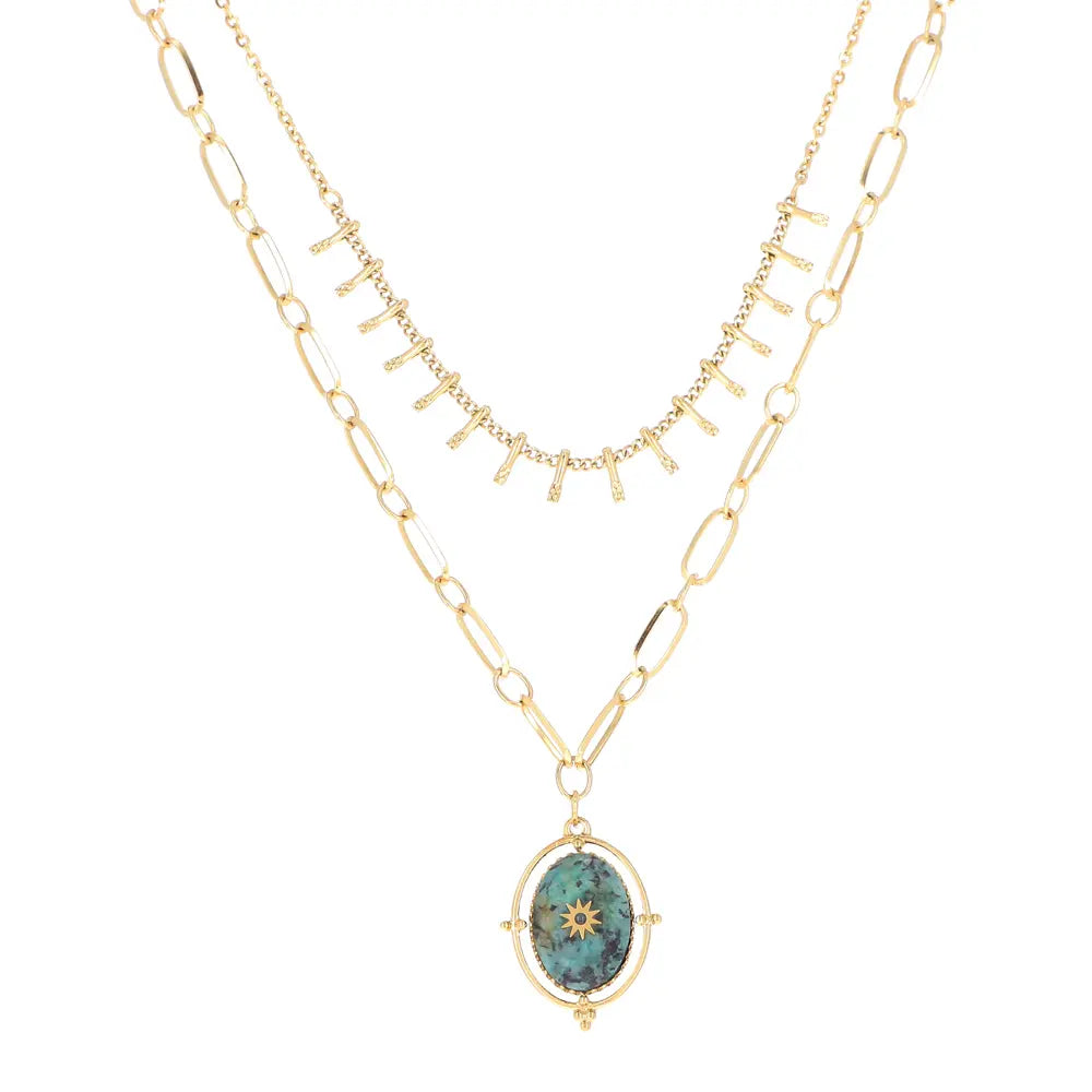 Collier rangs multiples en acier inoxydable doré composé d’une chaine maille fine avec picots et d’une chaine à maillon orné d'un médaillon 2